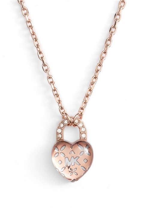 michael kors heart lock necklace|Michael Kors ear rings.